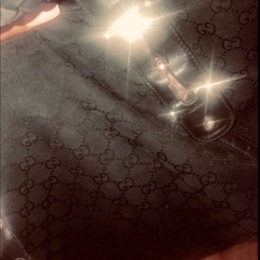 Gorgeous Gucci. G print pattern, black on black